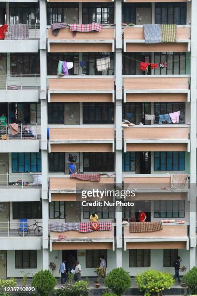 Students drying their beddings as they arrive at Dhaka University after reopen their residential halls after 18 months due to coronavirus crisis in...