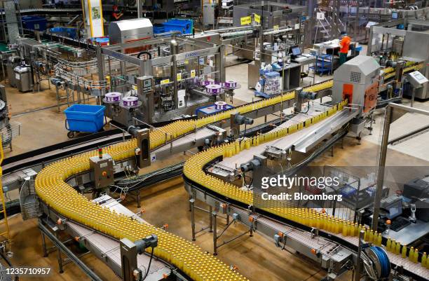 Orange flavoured drinks on the production line at the Refresco soft-drink bottling factory in Kegworth, U.K., on Tuesday, Oct. 5, 2021. PAI Partners...