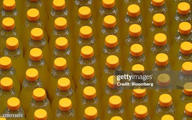 Orange flavoured drinks on the production line at the Refresco soft-drink bottling factory in Kegworth, U.K., on Tuesday, Oct. 5, 2021. PAI Partners...