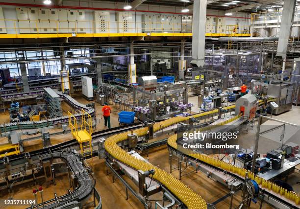 Orange flavoured drinks on the production line at the Refresco soft-drink bottling factory in Kegworth, U.K., on Tuesday, Oct. 5, 2021. PAI Partners...