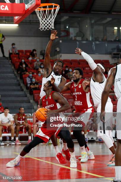 Travis Munnings, James Farr in action during the match for Liga Placard between SL Benfica and Vitória SC, at Pavilhão FIdelidade, Lisboa, Portugal...