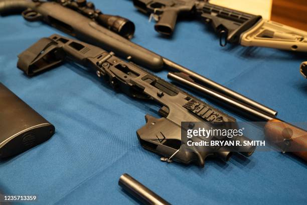 Confiscated guns are on display during a press conference at 1 Police Plaza October 5, 2021 in New York. - New York City Police Commissioner Dermot...
