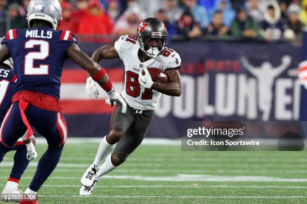 Tampa Bay Buccaneers wide receiver Antonio Brown makes a catch and fights for additional yardage during the regular season game between the Tampa Bay...