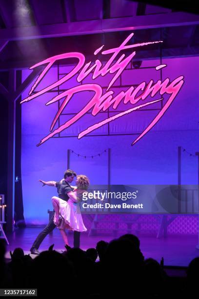 Performers are seen onstage during the curtain call of the gala performance of "Dirty Dancing" at the Richmond Theatre on October 5, 2021 in...