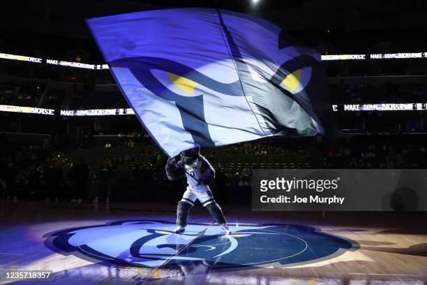 Mascot, Grizz of the Memphis Grizzlies waves a flag before a preseason game against the Milwaukee Bucks on October 5, 2021 at FedExForum in Memphis,...