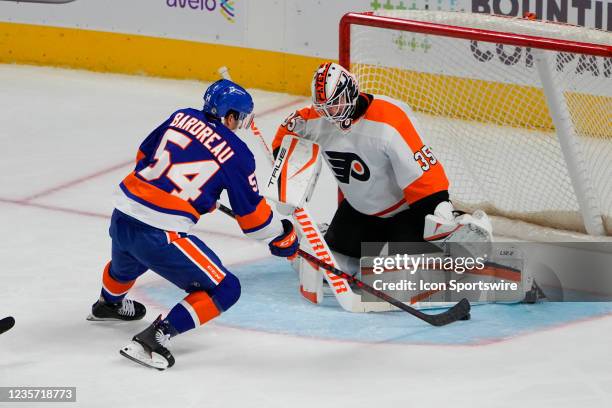 New York Islanders Center Cole Bardreau takes a shot on Philadelphia Flyers Goalie Martin Jones during the second period of the pre-season National...