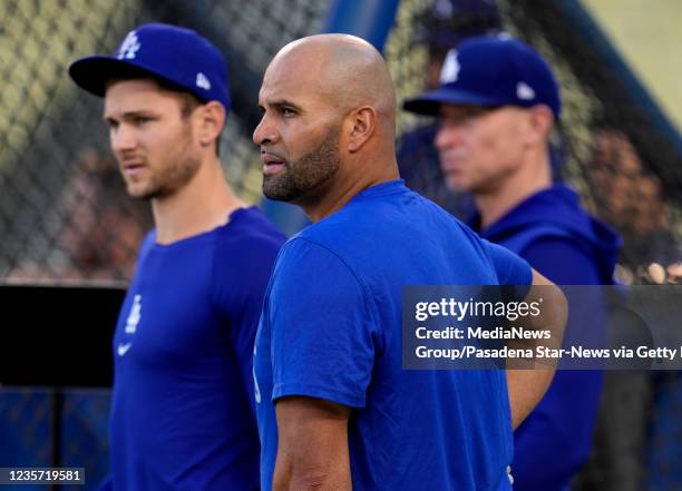 Los Angeles, CA Albert Pujols, center, along with Trea Turner of the Los Angeles Dodgers during a workout day before the National League Wildcard...