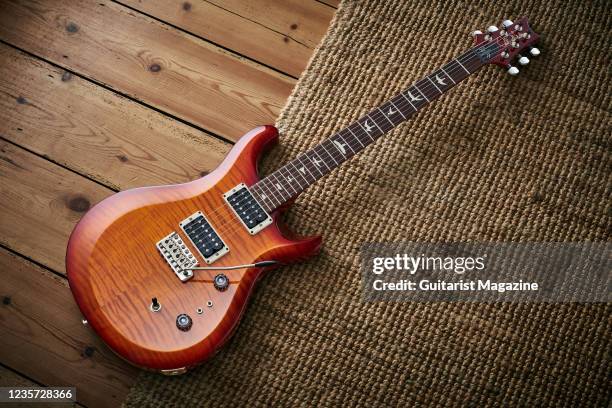 35th Anniversary Custom 24 electric guitar with a Dark Cherry Sunburst finish, taken on April 3, 2020.