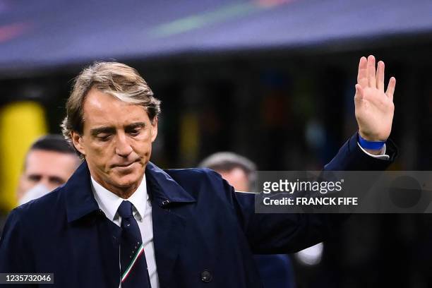 Italy's coach Roberto Mancini reacts as he arrives prior to the UEFA Nations League semifinal football match between Italy and Spain at the San Siro...