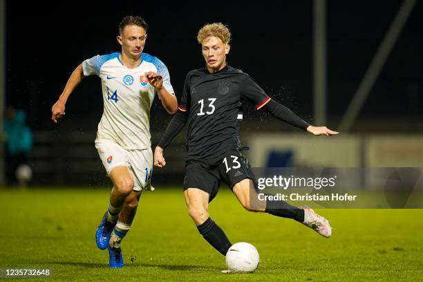 Dominik Holly of Slovakia U19 in action against Bent Andresen of Germany U19 during the Four Nations Tournament match between Slovakia U19 and...