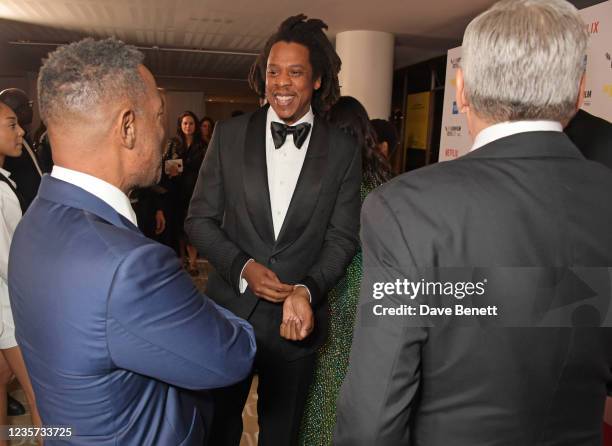Producer James Lassiter, Producer Shawn Carter aka Jay-Z and Netflix Co-CEO Ted Sarandos attend the Opening Night Gala for "The Harder They Fall"...