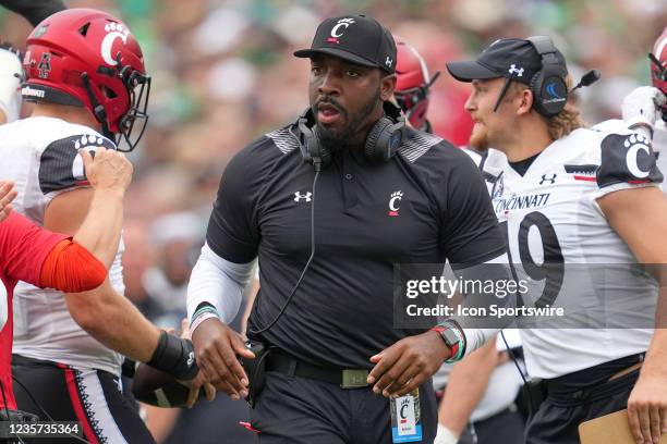 Cincinnati Bearcats defensive line coach Greg Scruggs looks on during a game between the Notre Dame Fighting Irish and the Cincinnati Bearcats on...