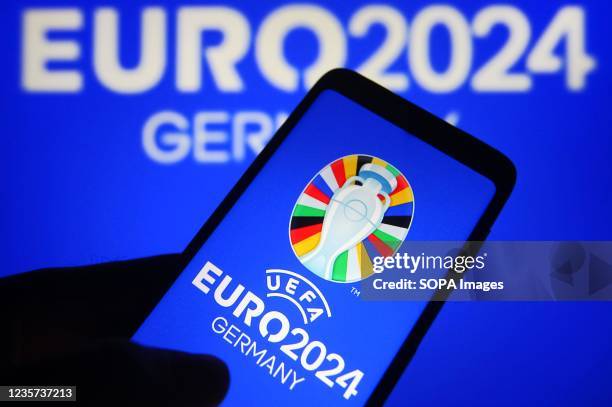 In this photo illustration, UEFA Euro 2024 logo is seen on a smartphone.