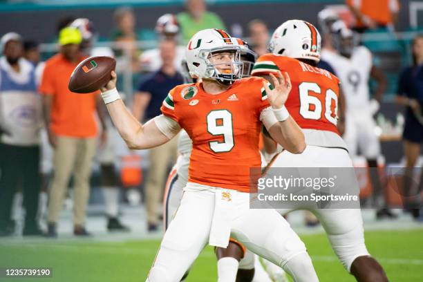 Miami quarterback Tyler Van Dyke throws the ball during the college football game between the Virginia Cavaliers and the University of Miami...