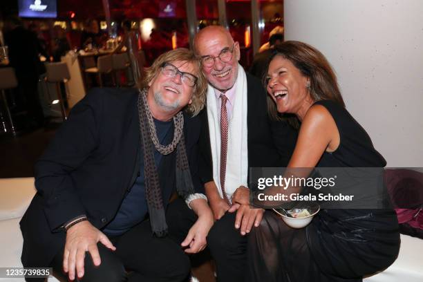 Martin Krug, Otto Retzer and his wife Shirley Retzer laugh during the 14th Audi Generation Award 2021 at Allianz Arena on October 6, 2021 in Munich,...