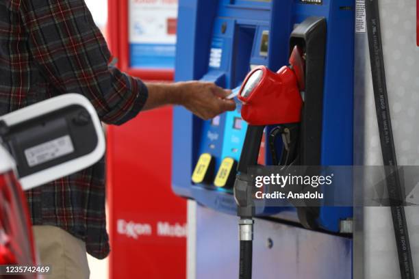 View of a fuel pump at a petrol station as US oil prices hit their highest levels since 2014 due to the deepening energy crisis in global markets, in...