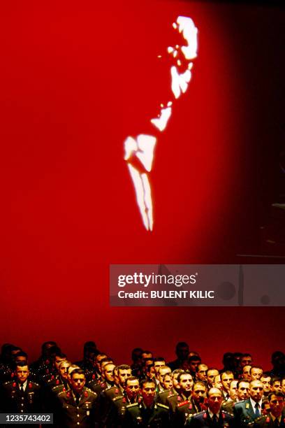 Army officers stand in front a picture of Mustafa Kemal Ataturk during a graduation ceremony of Turkish Military`s War Academy in Istanbul on July...