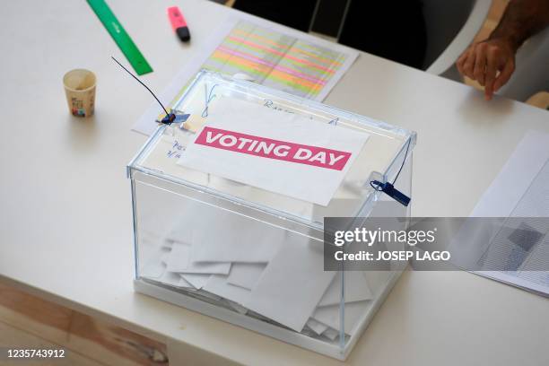 Ballot box is displayed at the Desigual multinational fashion company's headquarters in Barcelona, on October 7, 2021. - More than half of Desigual's...