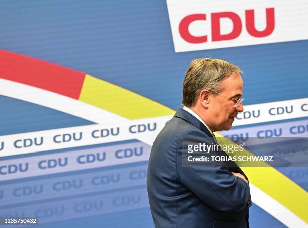 The leader of Germany's conservative Christian Democratic Union party and candidate for Chancellor Armin Laschet leaves the stage after giving a...