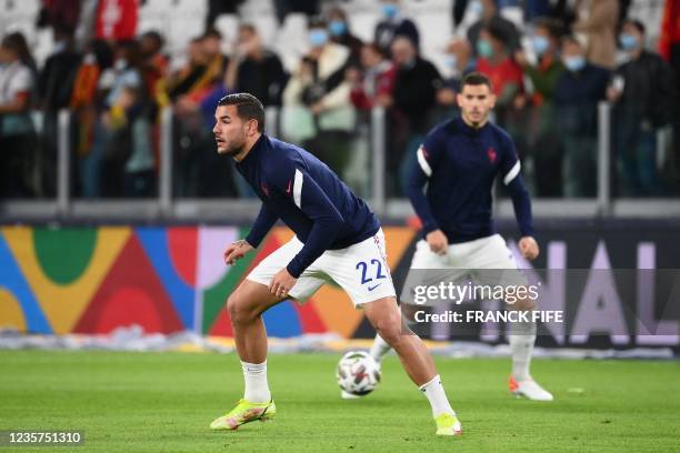 France's defender Theo Hernandez and France's defender Lucas Hernandez warm up prior to the UEFA Nations League semi-final football match between...