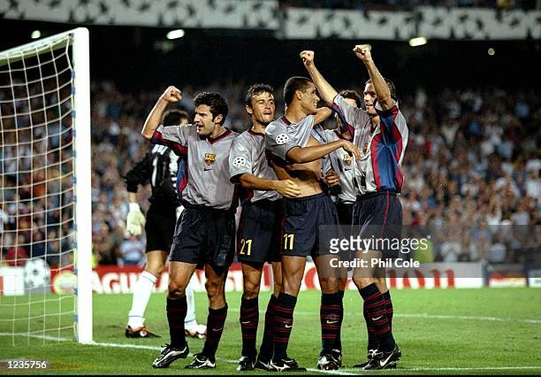 Barcelona celebrate Rivaldo's goal against Fiorentina during the UEFA Champions League group B match at the Nou Camp in Barcelona, Spain. Barcelona...