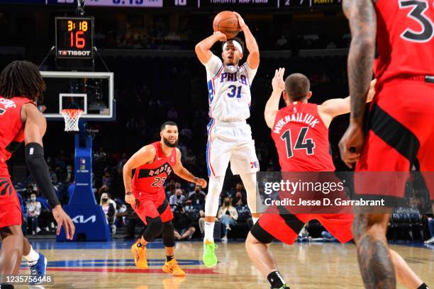 Seth Curry of the Philadelphia 76ers shoots the ball against the Toronto Raptors during a preseason game on October 7, 2021 at Wells Fargo Center in...