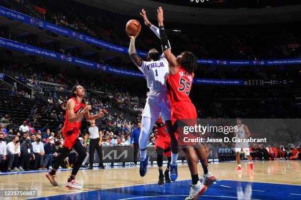 Andre Drummond of the Philadelphia 76ers shoots the ball against the Toronto Raptors during a preseason game on October 7, 2021 at Wells Fargo Center...