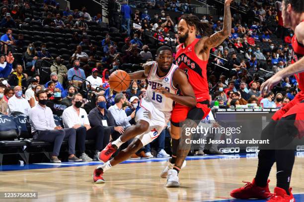 Shake Milton of the Philadelphia 76ers drives to the basket against the Toronto Raptors during a preseason game on October 7, 2021 at Wells Fargo...