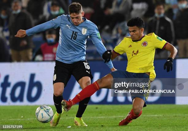 Uruguay's Federico Valverde and Colombia's Luis Diaz vie for the ball during their South American qualification football match for the FIFA World Cup...