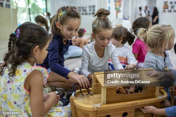 Students play with a recreation of Noahs ark as they learn about Noah during lessons at the Jewish Hebrew School on October 8, 2021 in Dubai, United...