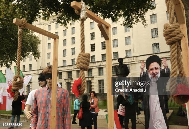 Protesters gather to stage a protest against Iranian President Ebrahim Raisi and executions in Iran ahead of World Day Against the Death Penalty in...