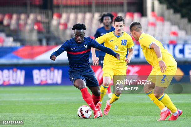 Dmytro KRYSKIV - 09 Arnaud KALIMUENDO during the UEFA U21 Championship Qualification match between France and Ukraine at Stade Francis Le Ble on...