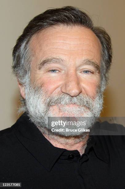 Robin Williams poses at the "Bengal Tiger at the Baghdad Zoo" Broadway cast photo call at The New 42nd Street Studios on February 16, 2011 in New...