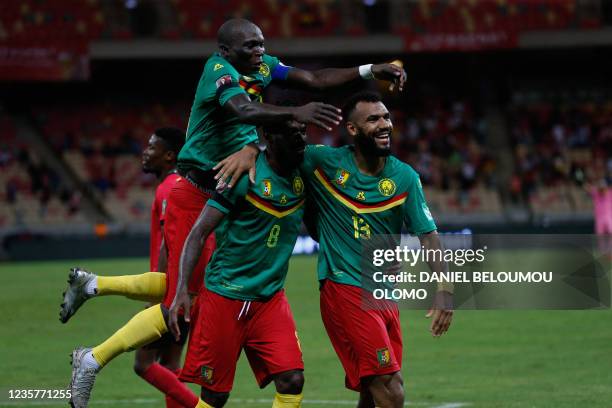 Cameroon striker Choupo-Moting is celebrated by teammates after scoring agains Mozambique during the FIFA World Cup Qatar 2022 qualifying round Group...