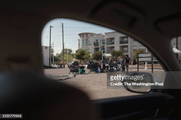 Camp of unsheltered people can be seen through the window of an ACS unit in downtown Albuquerque, NM on September 29, 2021. CREDIT: Adria Malcolm for...