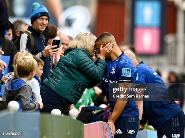 Dublin , Ireland - 9 October 2021; Leinster players, including Adam Byrne, left, celebrates with his mother Gillian after their side's victory in the...