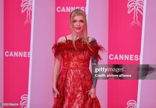 Cannes, France Canneseries, International Series Festival and MIPCOM with a female Guest attending the glamorous Opening Ceremony and Pink Carpet at...