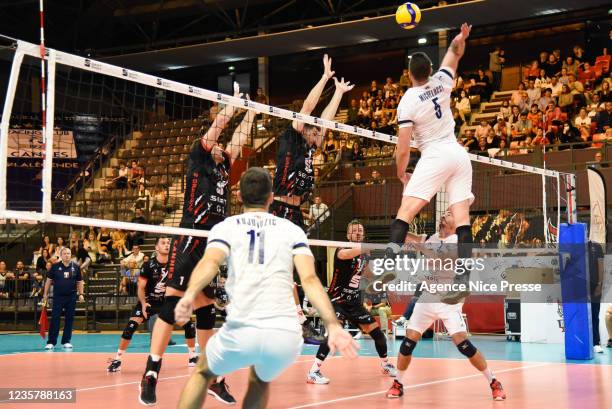 Krasimir GEORGIEV and Christian FROMM of Cannes and Renan MICHELLUCCI of Paris during the Ligue A match between Cannes and Paris on October 9, 2021...