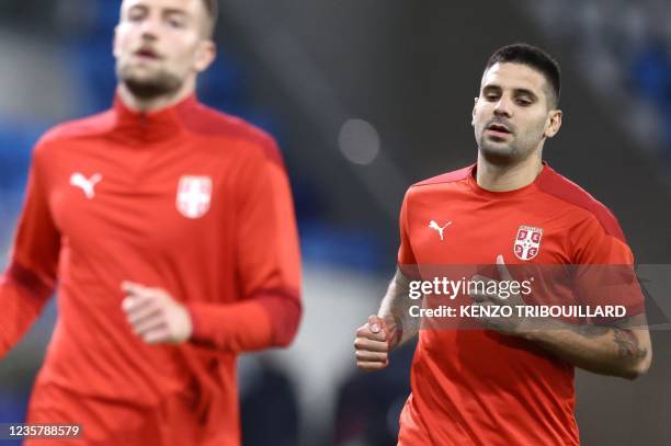 Serbia's forward Aleksandar Mitrovic warms up prior to the FIFA World Cup Qatar 2022 qualification Group A football match between Luxembourg and...