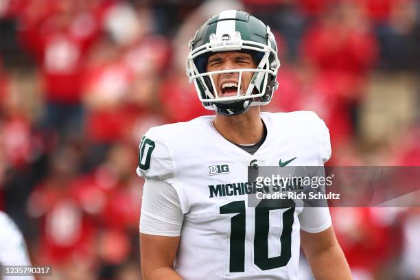 Quarterback Payton Thorne of the Michigan State Spartans reacts after a touchdown during the third quarter of a game against the Rutgers Scarlet...