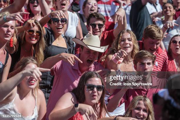Oklahoma Sooners fans celebrate after a touchdown against the Texas Longhorns on October 9th, 2021 at Cotton Bowl Stadium in Dallas, Texas.