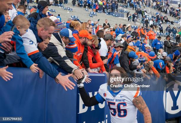 Casey Kline of the Boise State Broncos celebrates with fans after their win against the BYU Cougars October 9, 2021 at LaVell Edwards Stadium in...