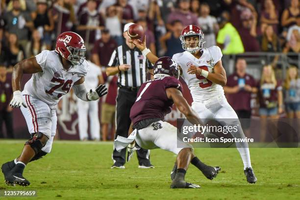 Alabama Crimson Tide quarterback Bryce Young throws a sidearm pass during second half action during a game between the Alabama Crimson Tide and the...