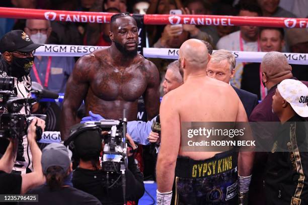 Challenger Deontay Wilder faces off WBC heavyweight champion Tyson Fury of Great Britain before the first round in their WBC/Lineal Heavyweight title...