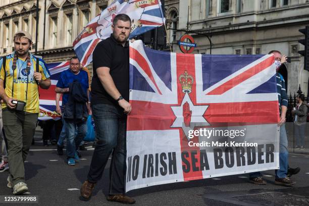 Loyalists march to Downing Street via Parliament Square to demonstrate against the Northern Ireland Protocol between the United Kingdom and the...