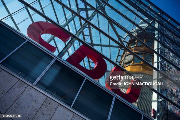 The logo of Germany's conservative Christian Democratic Union party is seen at the CDU headquarters on October 10, 2021 in Berlin.