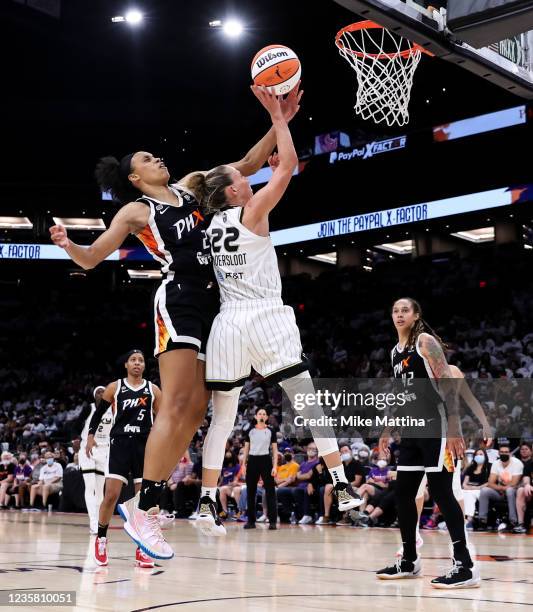 Megan Walker of the Phoenix Mercury blocks the shot attempt by Courtney Vandersloot of the Chicago Sky in the second half at Footprint Center on...