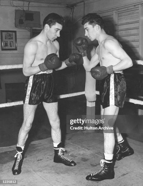 S GYMNASIUM FOR THEIR NEXT BOXING CONTEST. Mandatory Credit: Allsport Hulton/Archive