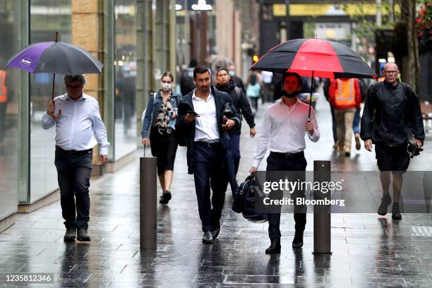 Commuters in Martin Place in Sydney, Australia, on Monday, Oct. 11, 2021. Residents of New South Wales who have received both doses of the covid...