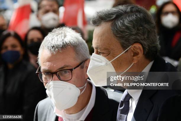 Italian Prime Minister, Mario Draghi , is welcomed by the General Secretary of the national trade union Italian General Confederation of Labour...